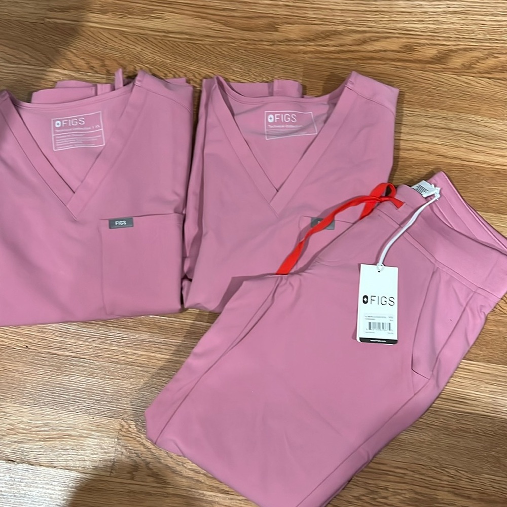 2 pink Catarina scrub shirts  xs worn once